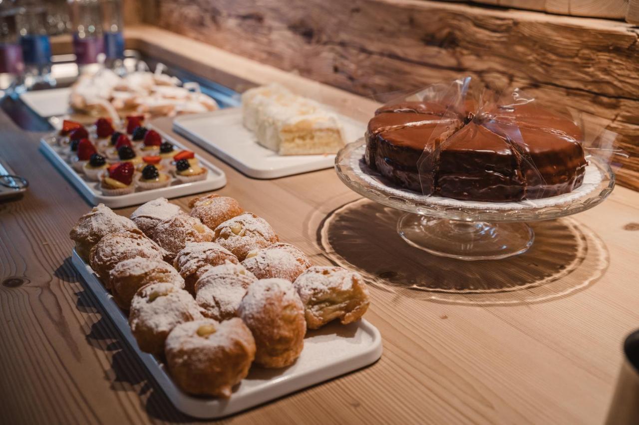 Fiori Dolomites Experience Hotel サン・ヴィート・ディ・カドーレ エクステリア 写真